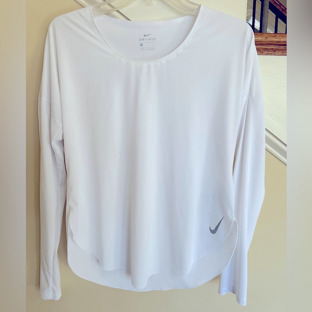 Nike brand new! Lightweight and thin! Under a vest, jacket or by itself!